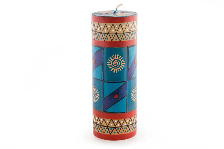 3" x 8" African Sky pillar. Turquoise, dark blue, cream and dark tan in dots, sunbursts, and geometric designs.