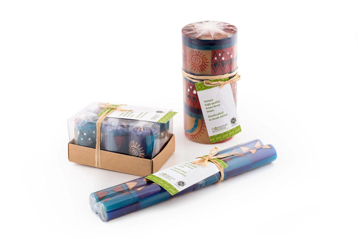 African Sky packaged as they come! Votive 6-pack, pillars & cubes come individually wrapped and tied with a story card, and a match taper pair wrapped with a story card - all ready for gifting in sustainable packaging.