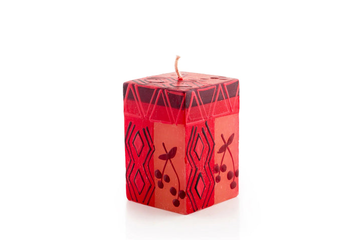 2" x 2" x 3" Berry Blaze cube candle. Bright red with darker berry design mixed with geometric design.