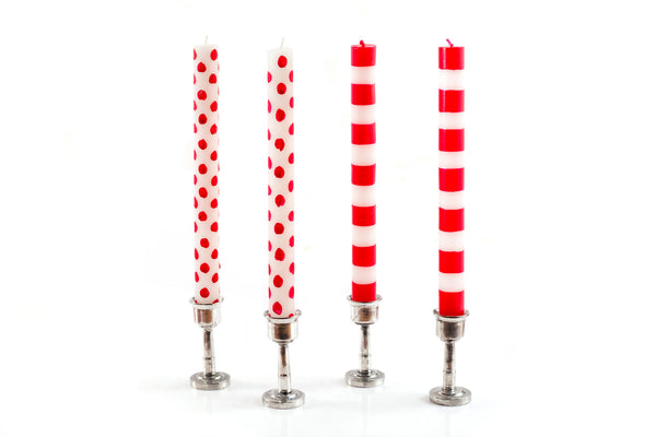 Two Red Dot on White tapers and  two Red Stripe on White  tapers in silver pewter taper holders. Fair Trade, Hand crafted.