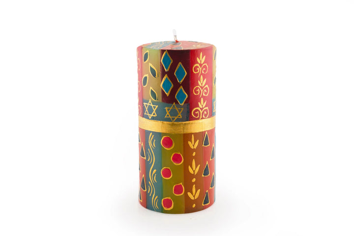 3" x 6" Judaica pillar candle. Rich colors of red, blue, light green, purple & turquoise with touches of gold and star of David intertwined in the design.