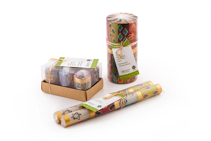 Packaging for the candles includes the votives 6-pack, votives wrapped individually with a story card, pillar & cubes wrapped and tied with story card, and matched taper pair wrapped and tied with story card.