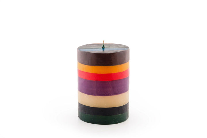 3" x 4" Memphis Stripe pillar candle. Handmade and hand painted with stripes of assorted colors, turquoise, golden yellow, burnt orange, purple, dark green, brown & beige. 