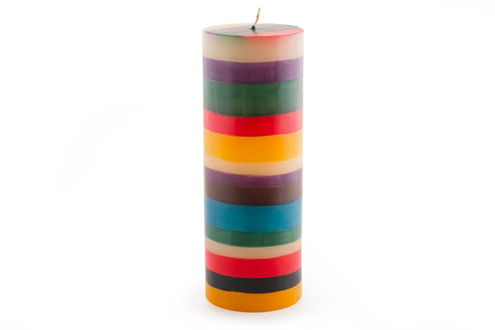 3" x 8" Memphis Stripe pillar candle. Handmade and hand painted with stripes of assorted colors, turquoise, golden yellow, burnt orange, purple, dark green, brown & beige.