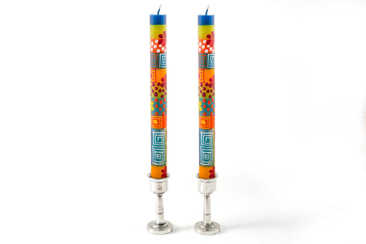 Summer taper match pair in silver pewter taper holders.  Tapers are full of summer colors, with flowers, dots stripes & squares. 