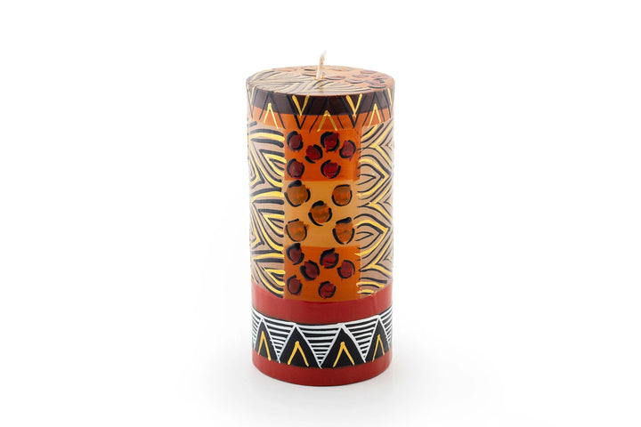 Animal Print 3" x 6" pillar candle. Hand crafted. Each candle is painted with 'prints' of African animals and touches of gold.  Fair Trade products. 