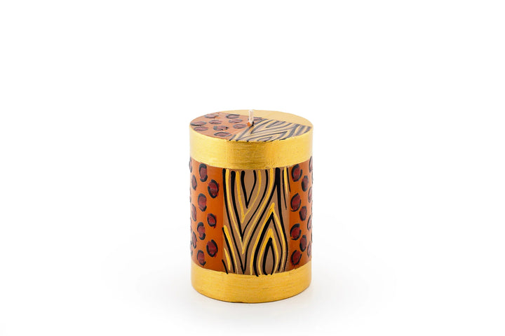 Animal Print 3" x 4" pillar candle. Hand crafted. Each candle is painted with 'prints' of African animals and touches of gold.  Fair Trade products. 