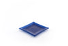 Glass candle coaster for pillar candles and cube candles. Photo shows a blue coaster 