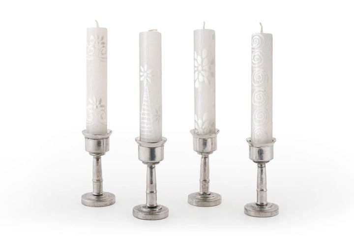 Elegant white design hand painted white  4" taper Shabbat candles. 4 different designs displayed in small pewter taper holders.  Fair Trade made in South Africa.