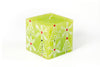 Whimsy Christmas 3" x 3" x 3" Cube Candle.  This one has a green base color and hand painted with trees, snow flakes and Christmas ornaments in white with red, green highlights.