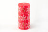 Whimsy Christmas 3" x 6"  Pillar Candle. This one has a red base color and hand painted with trees, snow flakes and Christmas ornaments in white with red, green highlights.