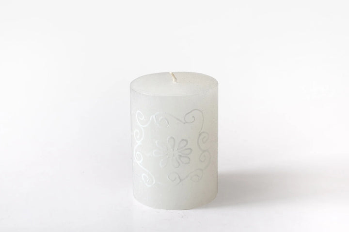 3" x 4" White on White pillar candle.  The designs include floral or graphic patterns painted in white on a white candle. Beautiful as they burn as the candle lights from within and shows the artistry on the candle.