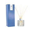 African Denim 200ml diffuser. The blue pattern on the gift box and glass diffuser is the pattern of denim worn by the Zulu women.  The diffuser has natural color reeds.