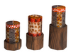 Wooden pillar holders in dark reclaimed wood. Three sizes; small, medium, and tall. Here is one of each size holding Animal Print pillar candles.